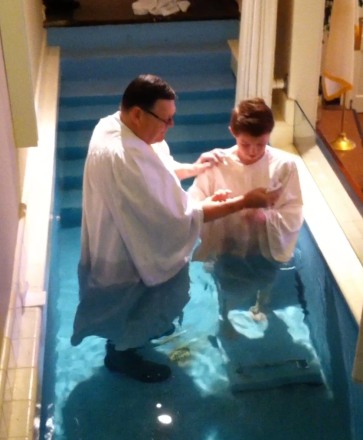 Rev. Bill Caverly baptizing Grand-nephew Patrick Dalton