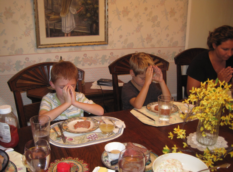 Grace before the ham loaf dinner, circa 2010 Patrick, Curtis, and Sarah