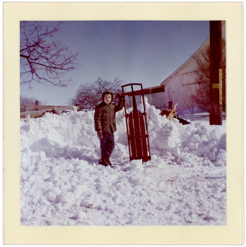 Brother Mark with sled and Skippy in the snow 1961